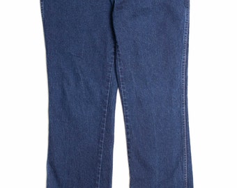 Ciemnoniebieskie dżinsy Wrangler
