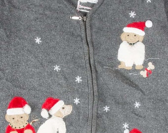 May include: Gray zip-up sweater with embroidered Christmas puppies wearing Santa hats and snowflakes. The sweater has a pocket with a red and green ribbon. The brand name "GEORGE" is visible on the tag.