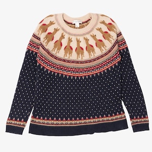 May include: A navy blue long-sleeve sweater featuring a cream-colored yoke with a repeating pattern of brown llamas. The garment includes a circular neckline, a multi-colored geometric border, and a white dotted pattern across the main body.