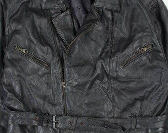 May include: A black leather jacket with a belted waist and multiple zippered pockets.