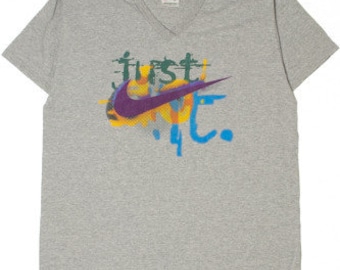 Camiseta vintage con cuello en V y logotipo de Nike "Just Do It"