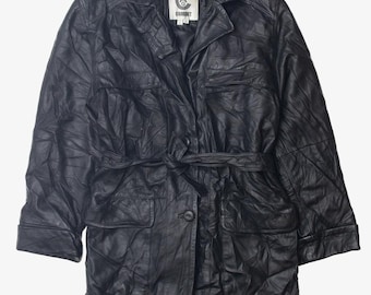 May include: A black leather jacket with a belt, two large pockets, and a smaller pocket on the chest. The jacket has a button closure and a label that reads "COMBAT".