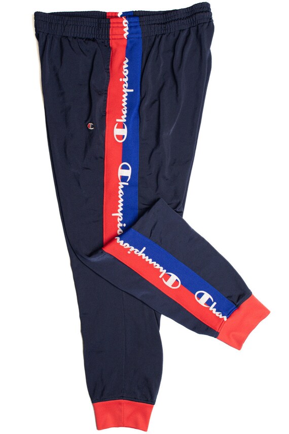 Champion track pants red hot sale