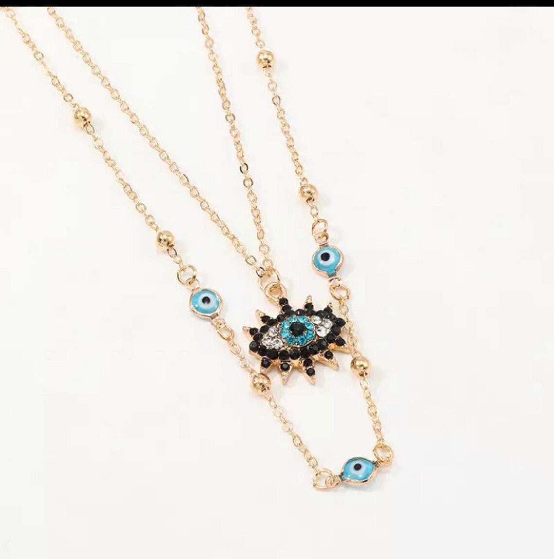 Multilayer blue eyes necklace Etsy