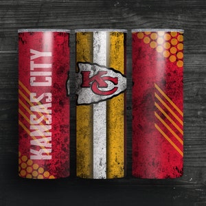 May include: Three stainless steel tumblers with a distressed red, white, and gold design. The tumblers feature the Kansas City Chiefs logo and the words "Kansas City".