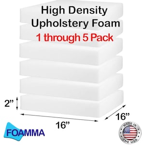 May include: Five white high density upholstery foam squares, each measuring 16 inches by 16 inches and 2 inches thick. The foam is stacked on top of each other. The text "High Density Upholstery Foam 1 through 5 Pack" is printed on the top foam square. The text "FOAMMA" is printed in blue on a white background below the foam squares. The text "MADE IN THE USA" is printed in black on a white background with a red, white, and blue American flag in the center.