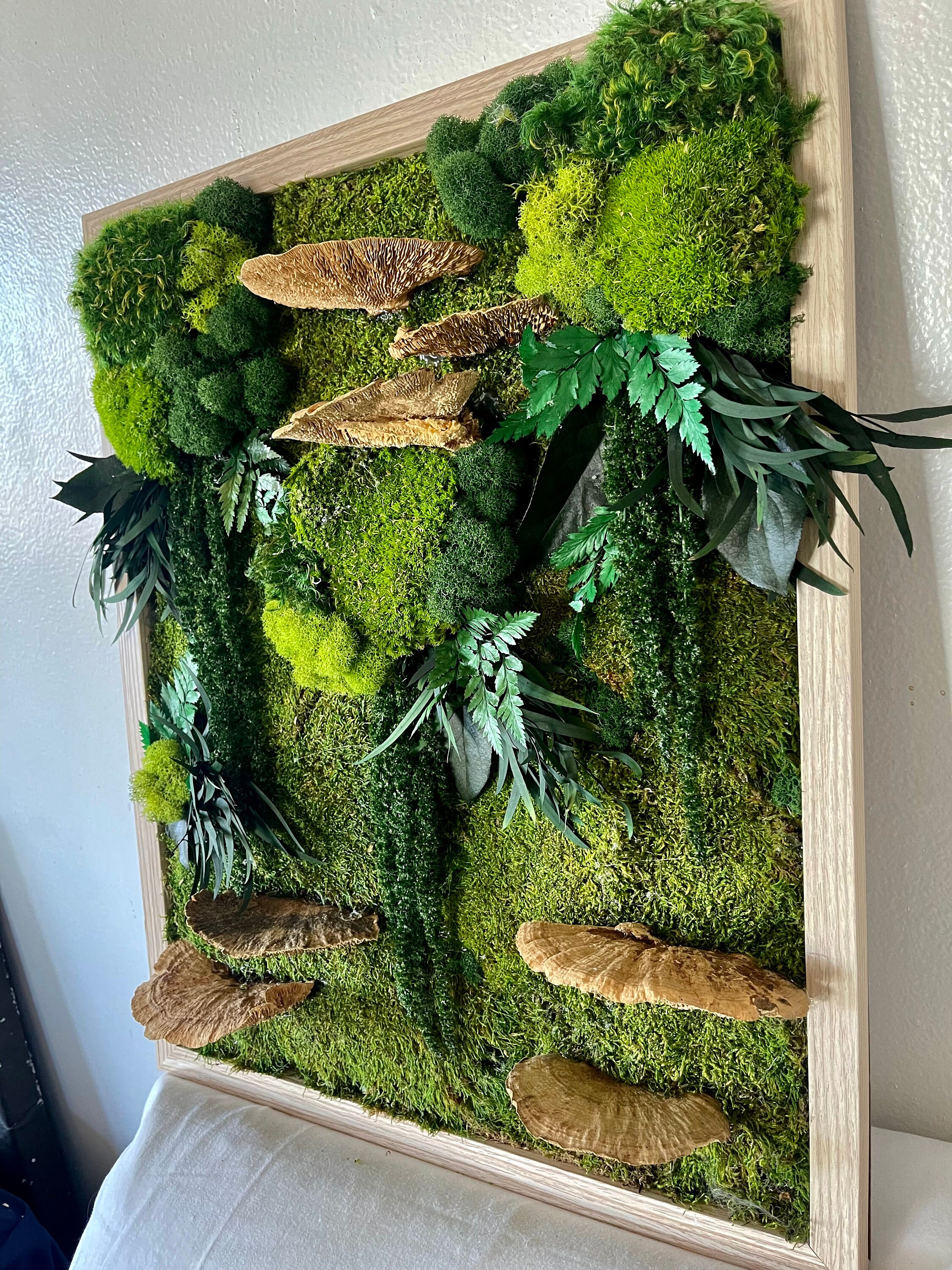 Lot of details for this unique hexagon moss wall art made with preserved moss