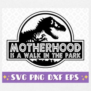 May include: A black and white digital graphic design featuring a silhouette of a dinosaur inside a circular frame. Below the dinosaur, the text reads MOTHERHOOD IS A WALK IN THE PARK. A purple banner at the bottom displays the text SVG PNG DXF EPS.
