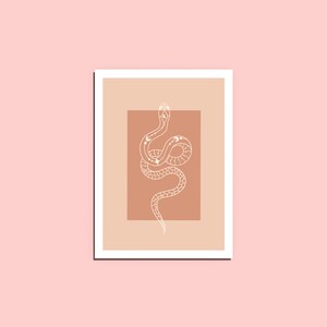 May include: A white line drawing of a snake with celestial symbols on a brown background. The snake is curled up in a circle with its head raised. The background is a light brown color.