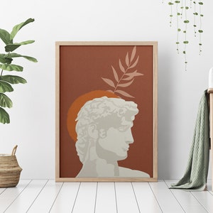 Pu&ograve; includere: Una stampa d'arte digitale che presenta una silhouette bianca di una testa di scultura classica su uno sfondo marrone con un ramo di foglie verdi. La scultura &egrave; circondata da un cerchio arancione.