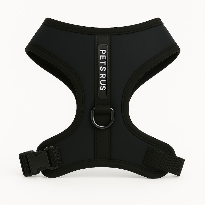 Sleek black neoprene dog harness in charcoal shade by PETsRUS. Features matching black hardware, breathable mesh lining, and dual adjustable straps for a perfect fit. No-pull dual clip design supports leash training and comfortable walking. Durable and stylish, ideal for urban pups or minimalistic pet owners. Great for small and medium breeds. Secure vest-style harness with quick-release buckle and soft padded support.