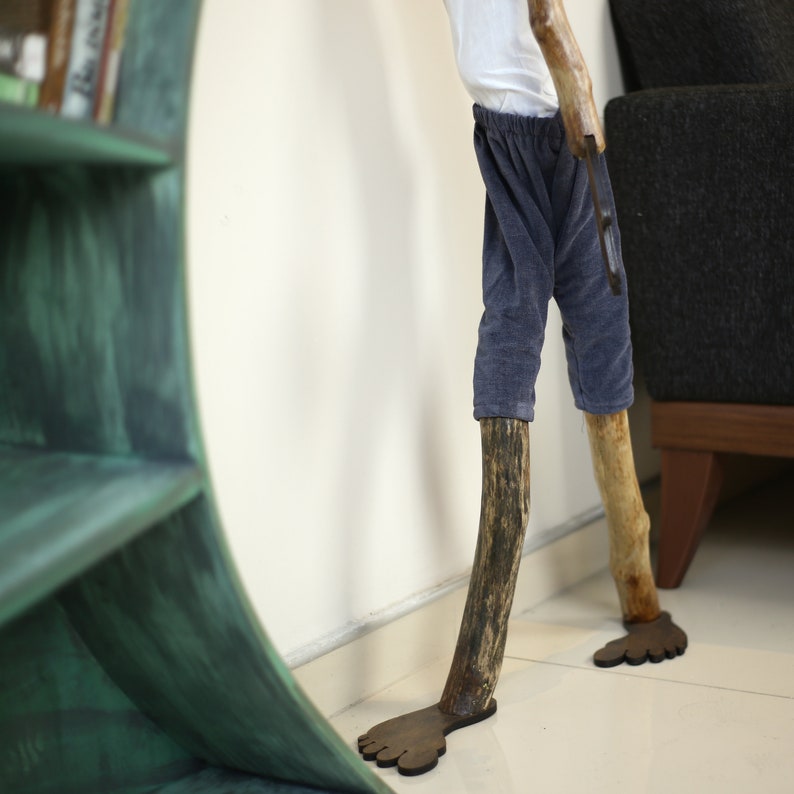 Falling Bookshelf, Accordion Bookcase, Man Holding Bookselves