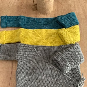 Hand-knitted wool baby vest. Very warm. Can be worn over pajamas. Penguin/Phildar wool