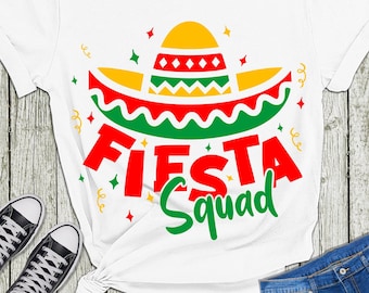 May include: White t-shirt with a green, red, and yellow sombrero and the text "Fiesta Squad" in red and green.