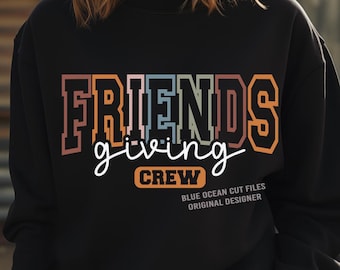 May include: Black sweatshirt with the words "FRIENDSgiving CREW" in a colorful, collegiate-style font. The text "DIGITAL FILES INSTANT DOWNLOAD" is at the top. The Blue Ocean logo and file type icons are at the bottom.