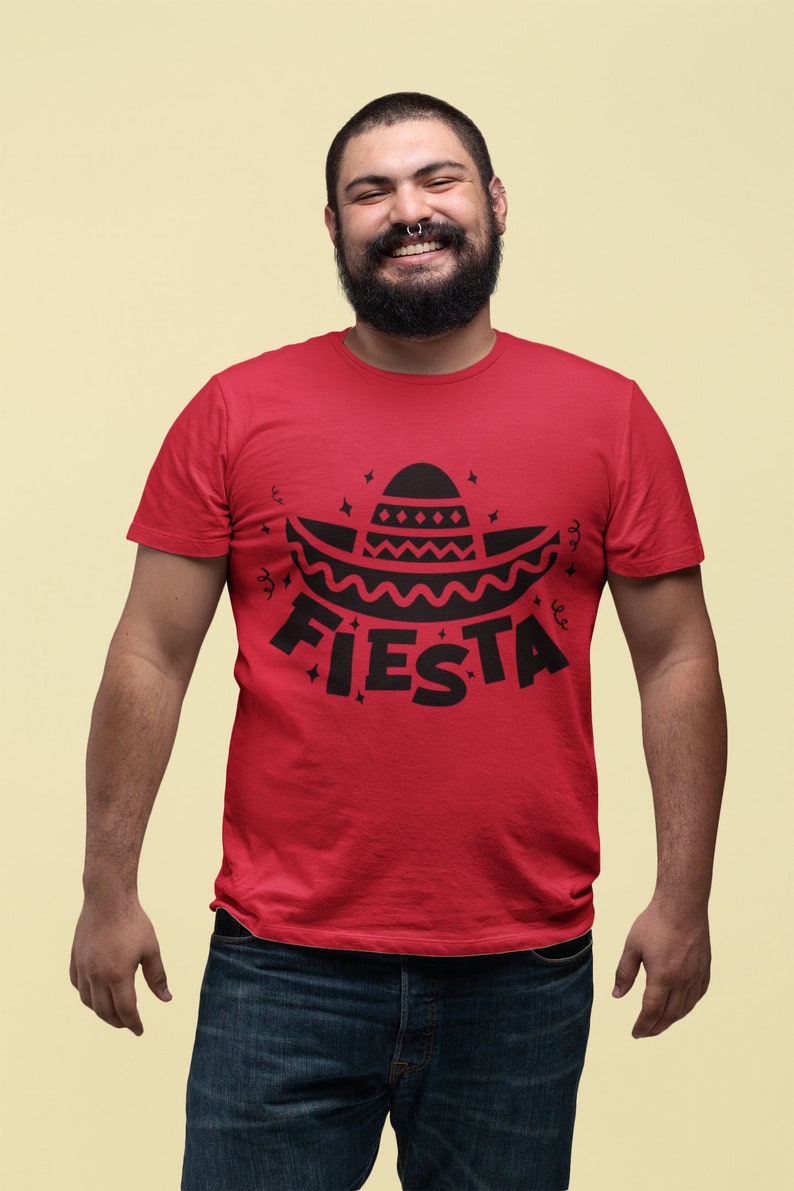 May include: A red t-shirt with a black graphic of a sombrero and the word "FIESTA" printed on the front.