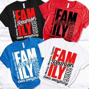May include: Four short-sleeved t-shirts in black, red, blue, and white. Each shirt features the words "FAMILY REUNION 2026" in a bold, layered design. The phrase "Making Memories Together" is printed vertically on the side, and "Over everything" is at the bottom.