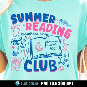 May include: A light blue t-shirt with a graphic design for a summer reading club. The design includes the words "Summer Reading Club" in blue and pink, along with illustrations of a book, seashells, and sunglasses.