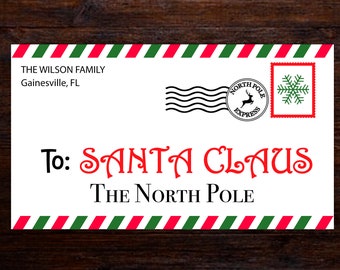May include: A printable Santa Claus mail envelope with red and green stripes, a North Pole Express stamp, and the text "To: SANTA CLAUS THE NORTH POLE".