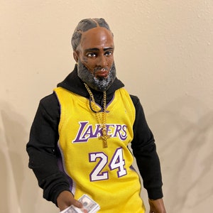 nipsey hussle wearing lakers jersey