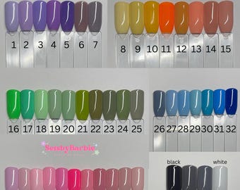 May include: A color chart with 47 different nail polish colors. The colors are arranged in rows and numbered 1 through 47. The colors include shades of purple, yellow, green, blue, pink, and gray.