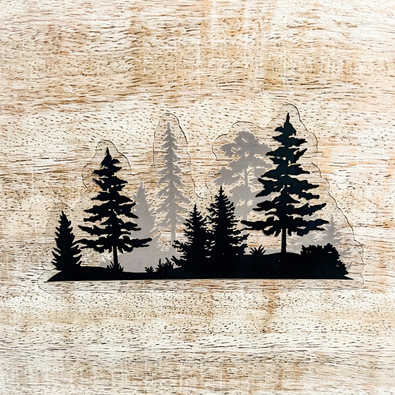 May include: Silhouette of a forest with multiple pine trees against a white background. The trees are black and the background is white.