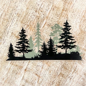 May include: Silhouette of a forest with black trees against a light wood background. The trees are in various sizes and shapes, with some taller than others. The trees are all black, while the background is a light wood colour.