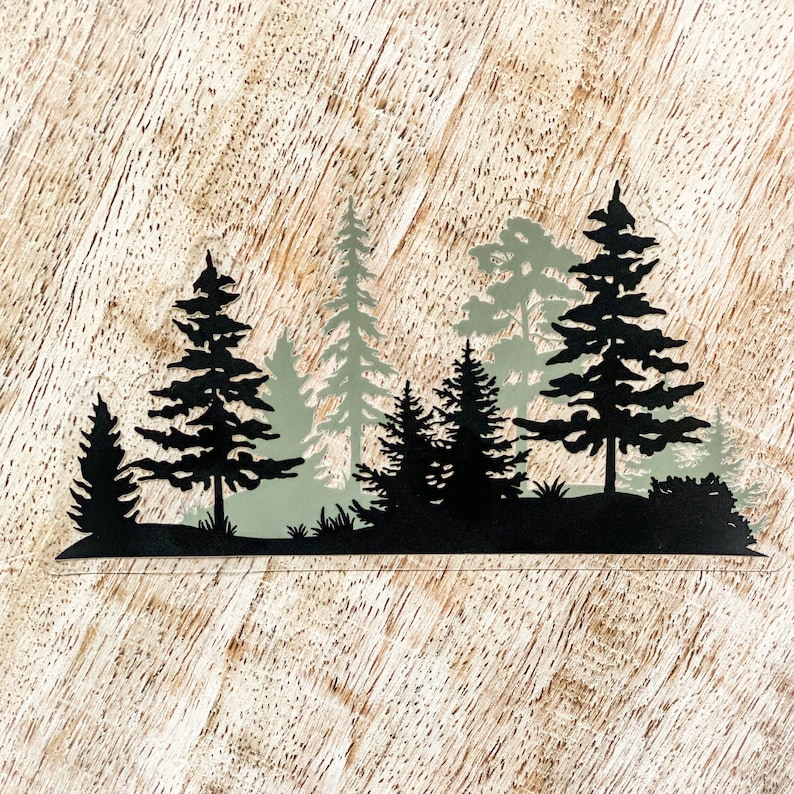 May include: Silhouette of a forest with black trees against a light wood background. The trees are in various sizes and shapes, with some taller than others. The trees are all black, while the background is a light wood colour.