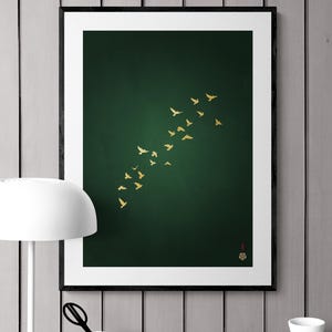 Rich looking dark green and gold birds artwork in a home office