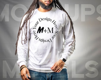 May include: A white long-sleeve shirt with a black circle design that says "Design Your Here M+M Design Your Here".