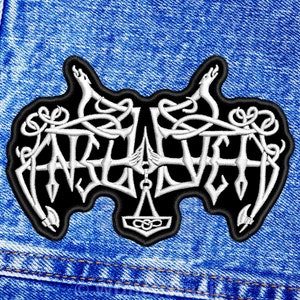 May include: Black and white embroidered patch with the word "ARCHETYPE" in a stylized font. The patch is on a blue denim background.
