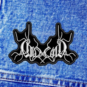 May include: Black and white embroidered patch with the word "Occult" in a stylized font.