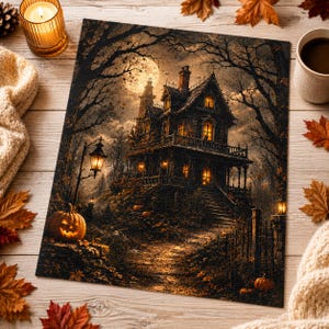 May include: A rectangular jigsaw puzzle featuring a dark, multi-story Victorian house at night under a full moon. The scene includes glowing windows, a lit street lamp, bare trees, and carved jack-o'-lanterns on a stone path with autumn leaves.