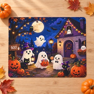 May include: A rectangular jigsaw puzzle featuring a Halloween scene with multiple white ghosts, black cats, and jack-o'-lanterns in front of a house decorated with string lights. A wooden sign on the left displays the text BOO! under a full moon.