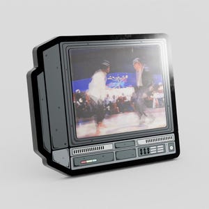 May include: A sticker featuring a retro television set with a screen displaying a blurred image of two people dancing. The TV is gray and black with a detailed design, including buttons and a speaker. The sticker has a white background.