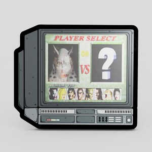 May include: A retro-style television with a video game screen displaying a "Player Select" screen. The screen shows a monster character, a question mark, and a row of character portraits. The TV has a black border.