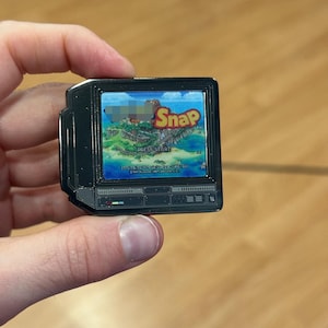 2.5" Lenticular Snap CRTV Enamel Pin