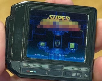 2.5" Lenticular Super Met. CRTV Enamel Pin