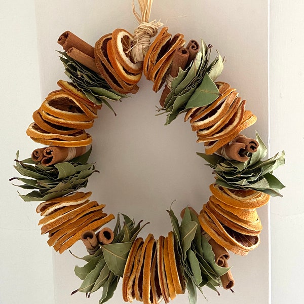 Dried orange, bay leaf and cinnamon wreath