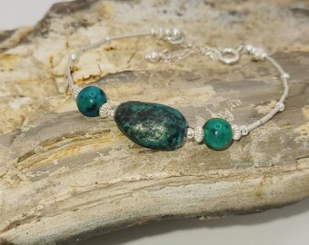 Dainty Turquoise and liquid silver beaded bracelet