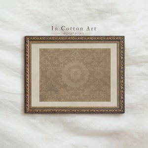 A framed picture with a decorative border is displayed against a white background.