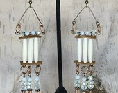 Hairpipe bone earrings with copper cones and copper rings and opalescent glass beads