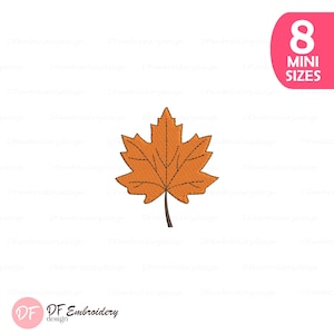 May include: An orange embroidered maple leaf with a brown stem. The leaf has detailed stitching and is set against a white background. A pink oval with the text "8 MINI SIZES" is in the upper right corner. The DF Embroidery design logo is in the lower left.