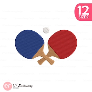 May include: An embroidered design featuring two crossed ping pong paddles, one blue and one red, with a white ping pong ball above them. The design includes the text "12 SIZES" in a pink circle.