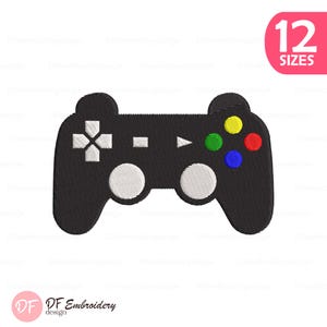 May include: Black video game controller with white buttons and directional pad, and colored buttons. The image includes the text "12 SIZES" in a pink circle. The logo "DF Embroidery design" is at the bottom.