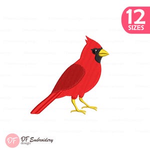 May include: An embroidery design of a bright red cardinal bird with a yellow beak, black face markings, and yellow feet. The design is shown in profile facing right. A pink graphic in the top right corner displays the text 12 SIZES.