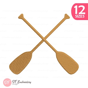 Puede incluir: Dos remos cruzados de color beige, con un diseño texturizado. La imagen incluye un círculo rosa con el texto "12 SIZES" y un logotipo con el texto "DF Embroidery design".
