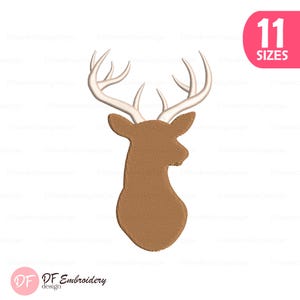 May include: A brown deer head design with white antlers. The design is textured and includes the text "11 SIZES" in a pink rounded rectangle. The logo "DF Embroidery design" is in the bottom left corner.