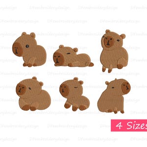 May include: A collection of six embroidered capybara designs in various poses. The capybaras are brown with tan faces and are in different positions, including sitting, lying down, and standing. The image includes the text "4 Sizes" in a pink rectangle.