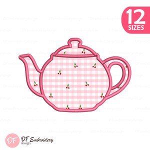 May include: An embroidery design of a teapot featuring a pink and white gingham pattern with small red cherry motifs. The teapot has a thick pink outline, a curved spout, and a handle. A pink corner tag displays the text 12 SIZES in white.